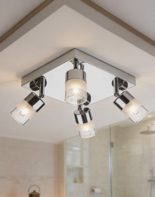 The Bright Chrome Adjustable Bathroom Spot Lights Attached to a Cream Coloured Shower Room Ceiling - Digital Illustration The Bright Chrome Adjustable Bathroom Spot Lights Attached to a Cream Coloured Shower Room Ceiling - Digital Illustration