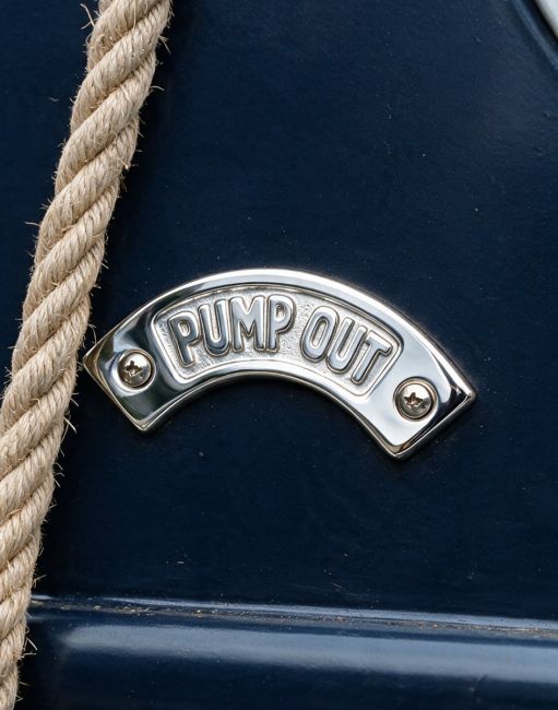 Bright Chrome Cast Arched Sign "Pump Out"