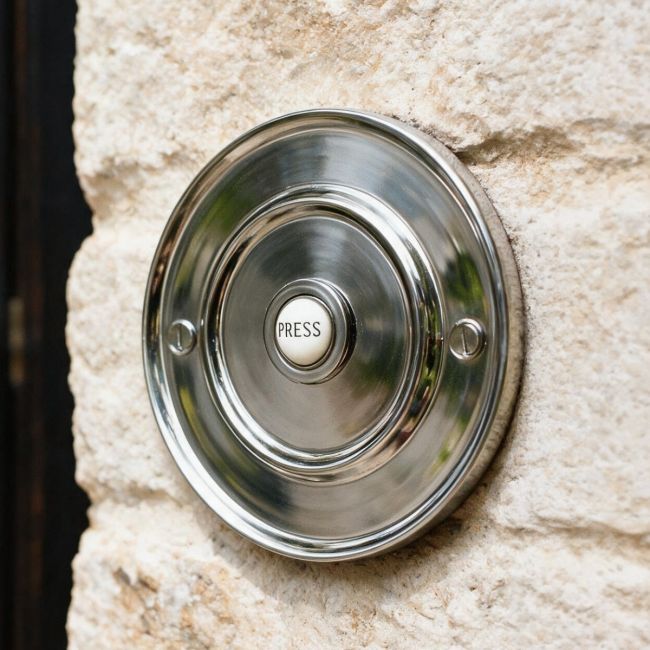 The Bright Chrome Sovereign Park Classic bell push on a Stone Wall of a Traditional Home - Digital Illustration The Bright Chrome Sovereign Park Classic bell push on a Stone Wall of a Traditional Home - Digital Illustration