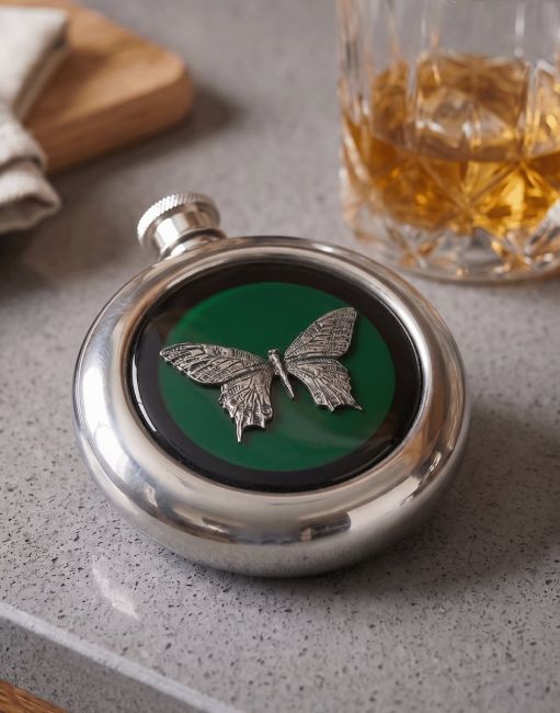 The Butterfly Whiskey Flask Placed on a Kitchen Work Surface with a Glass of Whisky - Digital Illustration