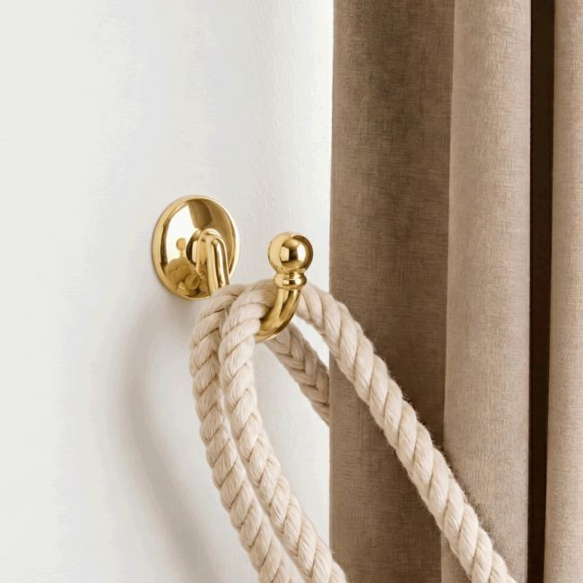 The Cavendish curtain tie-back hook Fixed on a Contemporary Interior Wall Next to a Brown Curtain - Digital Illustration The Cavendish curtain tie-back hook Fixed on a Contemporary Interior Wall Next to a Brown Curtain - Digital Illustration