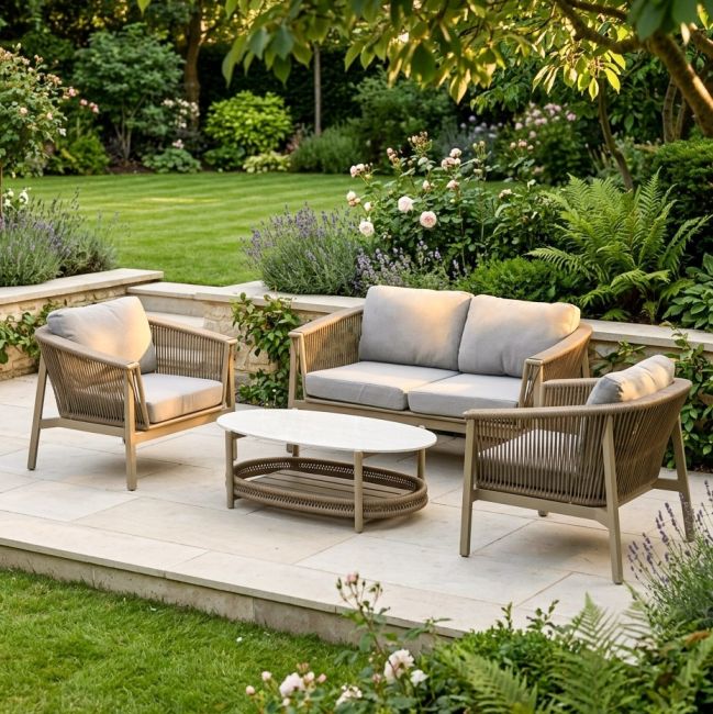 The Champagne "Chester" 4-Seater Outdoor Furniture Set on a Marble Patio Surrounded by Plants - Digital Illustration 