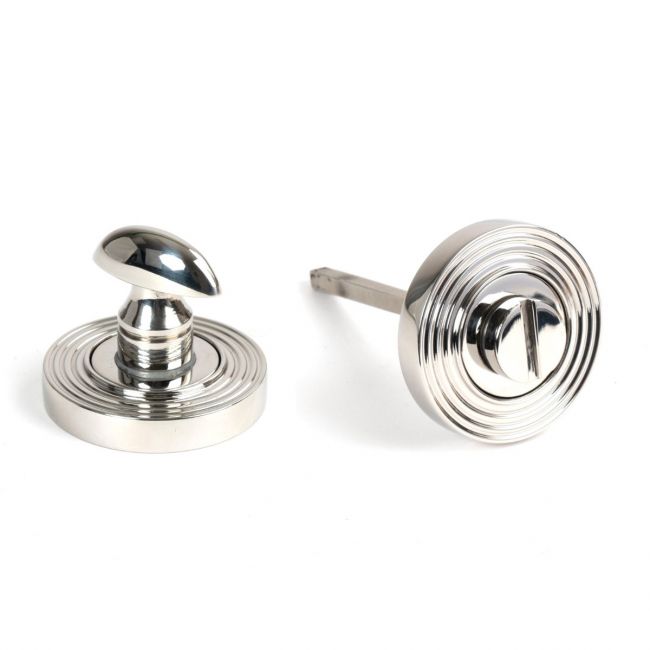 The Concealed Beehive Bathroom Turn & Release Set in Polished Stainless Steel Showing the Front and the Back Section Side by Side