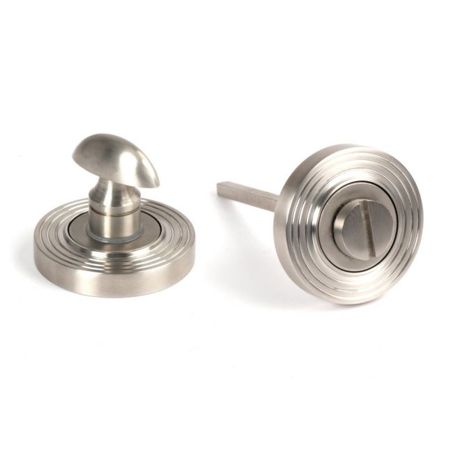 The Concealed Beehive Bathroom Turn & Release Set in Satin Stainless Steel Shown with Thumb Turn and Coin Escape