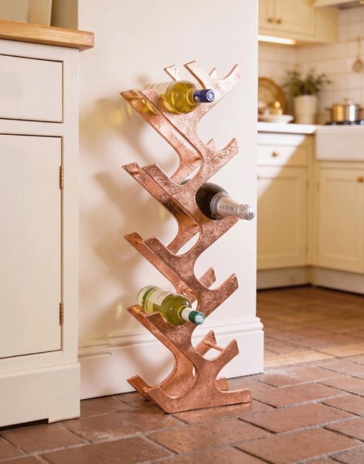 The Copper "Art Deco" 11 Bottle Wine Rack on a Polished Brick Tiled Floor in a Sunny Kitchen - Digital Illustration The Copper "Art Deco" 11 Bottle Wine Rack on a Polished Brick Tiled Floor in a Sunny Kitchen - Digital Illustration