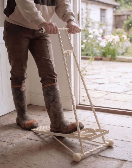 The Cream Glenmore Boot Jack Being Used in a Stone Tiled Cottage Porch - Digital Illustration