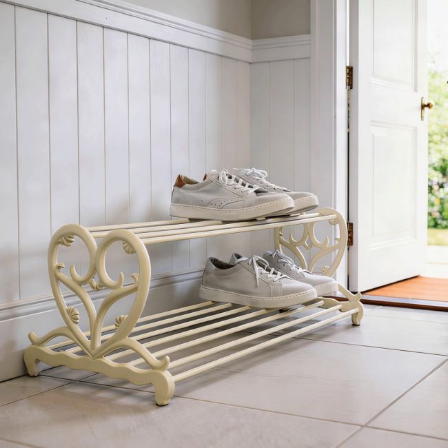 The Cream “Loredana” Heart Shoe Stand in a Tiled Doorway Entrance with Trainers on Top - Digital Illustration The Cream “Loredana” Heart Shoe Stand in a Tiled Doorway Entrance with Trainers on Top - Digital Illustration