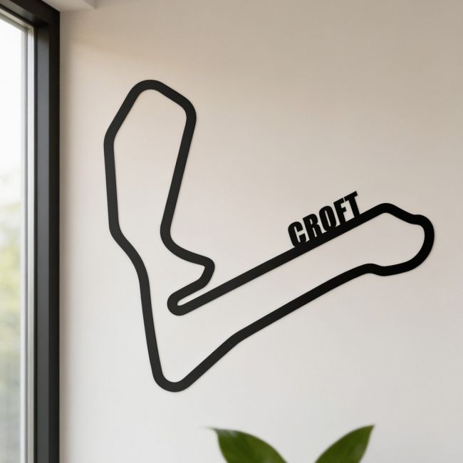 Croft Race Track on Display on a Rustic White Wall