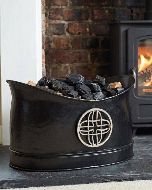 The “Cynbel Kiln” Celtic Log & Coal Holder on a Modern Fireplace Next to a Log Burner - Digital Illustration