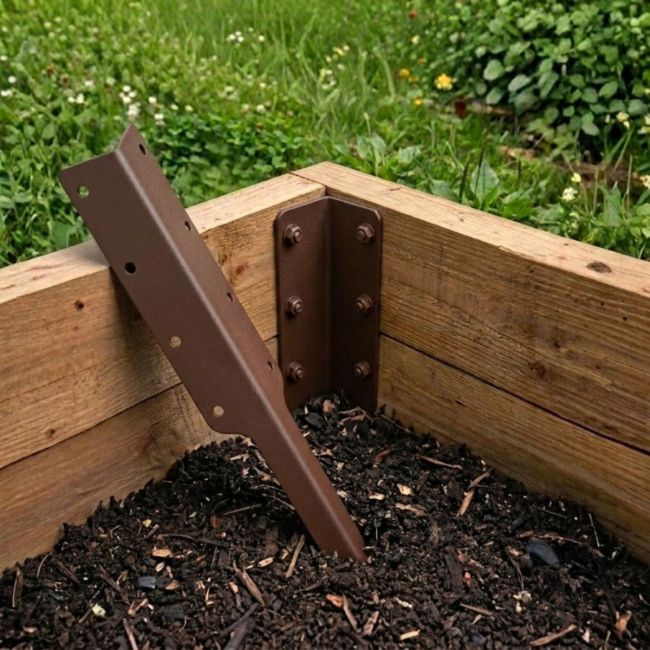 The Brown Railway Sleeper Corner Spikes - Double on a White Background The Brown Railway Sleeper Corner Spikes - Double on a White Background