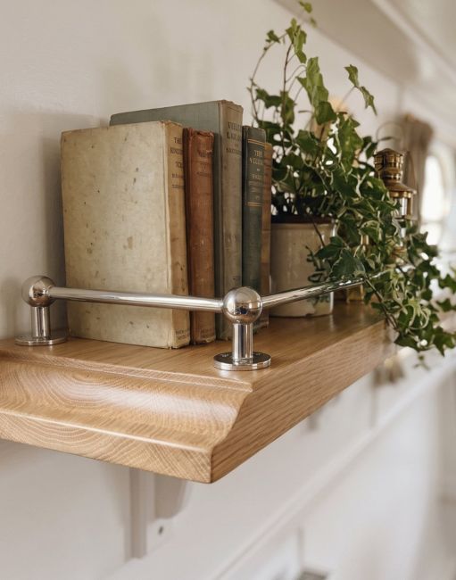 The Gallery Posts For 12.5mm (½’’) Tubes in Bright Chrome Used on a Shelf inside a Home - Digital Illustration