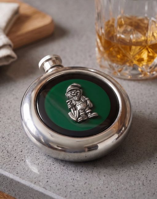 The Gnome Whiskey Flask next to a Glass Tumbler with Whiskey - Digital Illustration