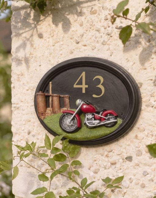 A Number 82 Hand Painted "Classic Cruiser" Motorbike House Sign Mounted on a Cream Coloured Cottage Garden Wall - Digital Illustration A Number 82 Hand Painted "Classic Cruiser" Motorbike House Sign Mounted on a Cream Coloured Cottage Garden Wall - Digital Illustration