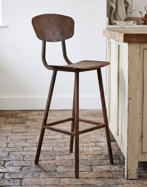 The High Rustic Iron Pub Stool next to a Kitchen Island in a Traditional Cottage - Digital Illustration 