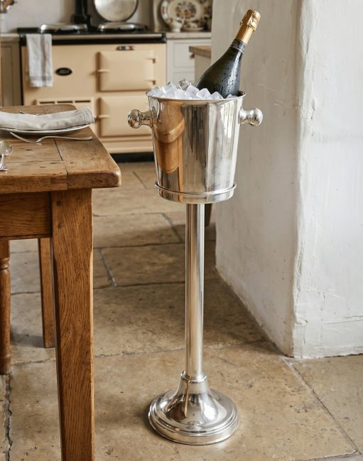 The Highbury Court Genuine Silver Plated Deluxe Wine & Champagne cooler with Stand in a Classic Country Kitchen - Digital Illustration