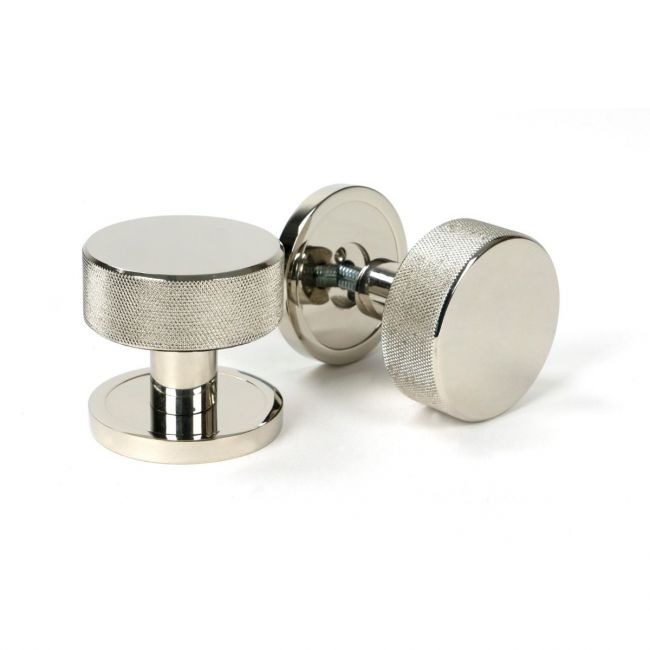 The Knurled Mortice/Rim Knob Set on a Plain Rose in Polished Nickel Shown Upright and on its Side The Knurled Mortice/Rim Knob Set on a Plain Rose in Polished Nickel Shown Upright and on its Side