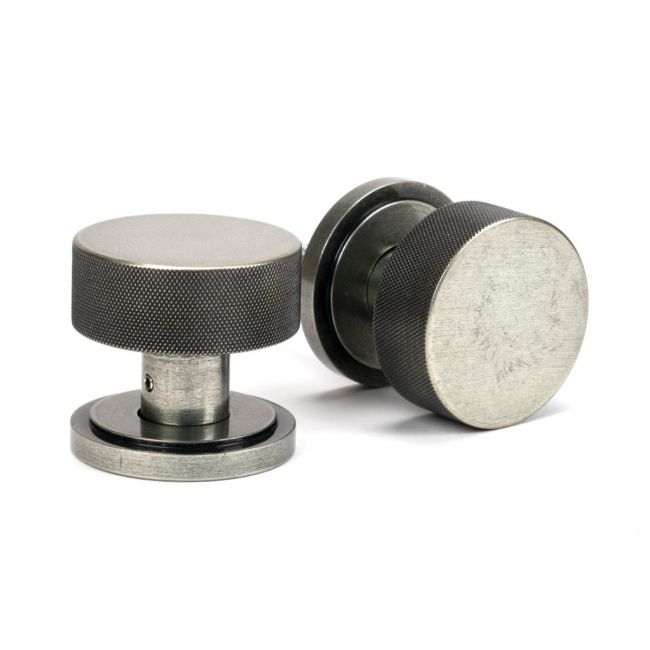The Knurled Mortice/Rim Knob Set on an Art Deco Rose in Pewter Shown Upright and on its Side The Knurled Mortice/Rim Knob Set on an Art Deco Rose in Pewter Shown Upright and on its Side
