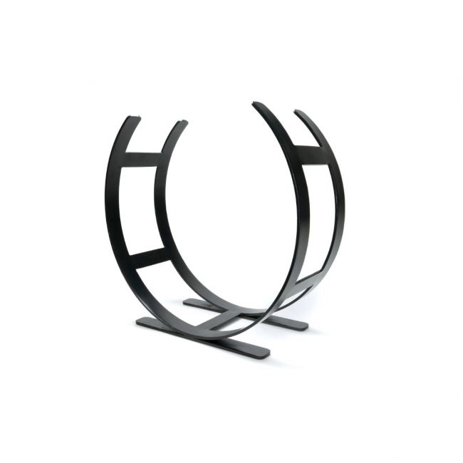 The Large Curved Fireside Log Holder in Matt Black Shown from an Angle on a White Background