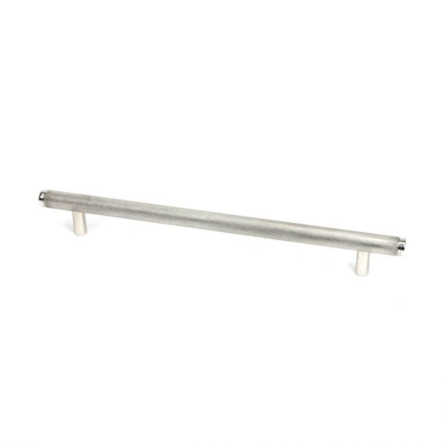 The Large Knurled Cabinet Pull Handle in Polished Stainless Steel Shown Upright on a White Background The Large Knurled Cabinet Pull Handle in Polished Stainless Steel Shown Upright on a White Background