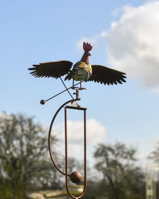 The Large Metal Rooster Rocking Garden Spike Displaying the Rooster Mounted on the Spike