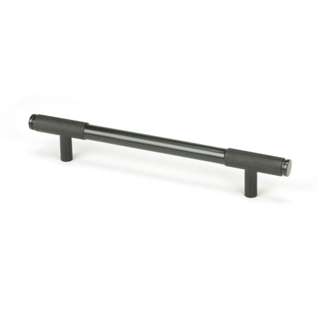 The Medium Half Knurled Cabinet Pull Handle in Aged Bronze Shown Upright on a White Background The Medium Half Knurled Cabinet Pull Handle in Aged Bronze Shown Upright on a White Background