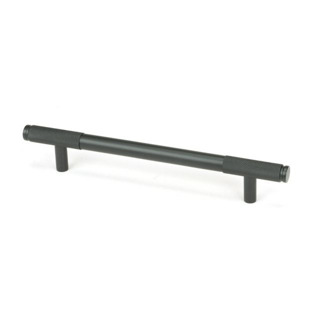 The Medium Half Knurled Cabinet Pull Handle in Matt Black Shown Upright on a White Background The Medium Half Knurled Cabinet Pull Handle in Matt Black Shown Upright on a White Background