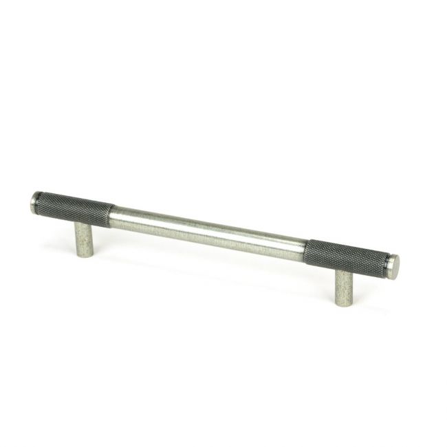 The Medium Half Knurled Cabinet Pull Handle in Pewter Shown Upright on a White Background The Medium Half Knurled Cabinet Pull Handle in Pewter Shown Upright on a White Background