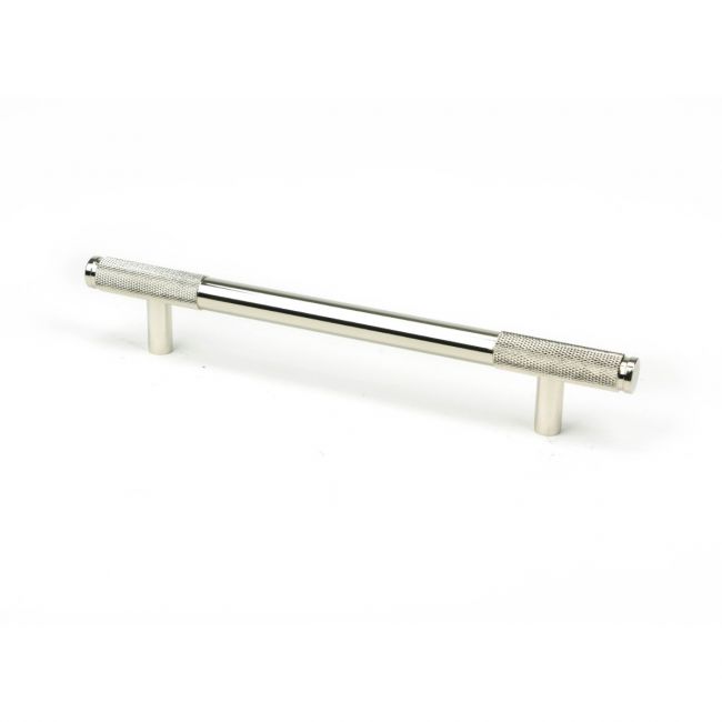 The Medium Half Knurled Cabinet Pull Handle in Polished Nickel Shown Upright on a White Background The Medium Half Knurled Cabinet Pull Handle in Polished Nickel Shown Upright on a White Background
