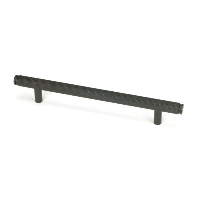 The Medium Knurled Cabinet Pull Handle in Aged Bronze Shown Upright on a White Background