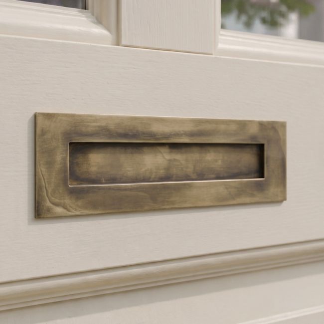 The Modern 10 Inch Front Door Letter Plate - Contemporary Minimalist Flap in an Aged Brass Finish The Modern 10 Inch Front Door Letter Plate - Contemporary Minimalist Flap in an Aged Brass Finish