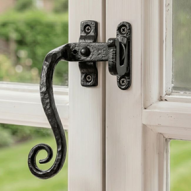 The Monkeytail Casement Stay With Hook Plate Fitted on a Traditional Wooden Window Frame - Digital Illustration 