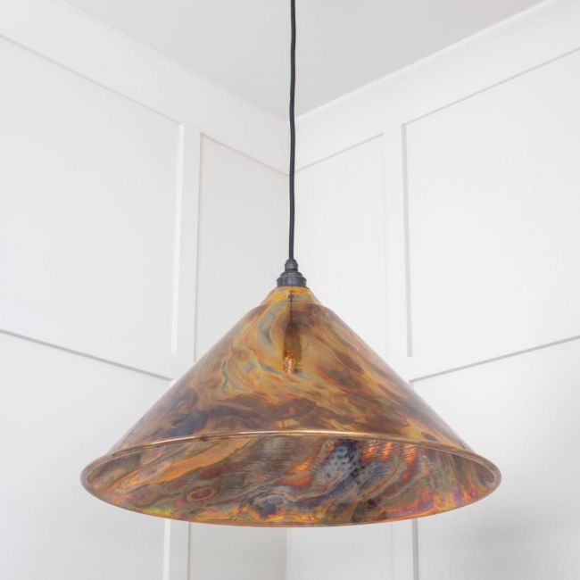 The Nidus Pendant Light in a Burnished Finish Shown From a Low Angle