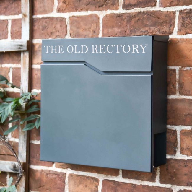 The Personalised Granite Grey _Staggered_ Wall Mounted Post Box & Newspaper Holder with a Customised House Name on the Top Panel - Digital Illustration The Personalised Granite Grey _Staggered_ Wall Mounted Post Box & Newspaper Holder with a Customised House Name on the Top Panel - Digital Illustration