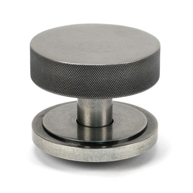 The Pewter Knurled Centre Door Knob on an Art Deco Rose on a White Background Shown Upright The Pewter Knurled Centre Door Knob on an Art Deco Rose on a White Background Shown Upright