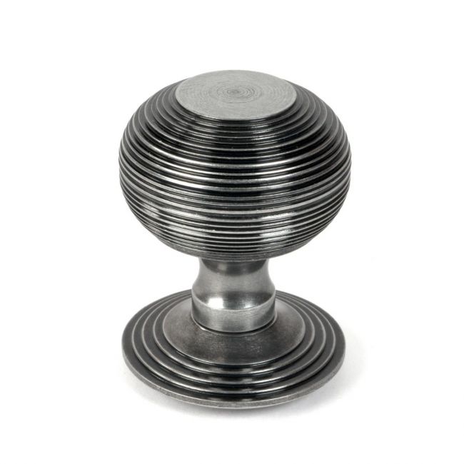 The Pewter Traditional Beehive Centre Door Knob Shown Upright on a White Background 