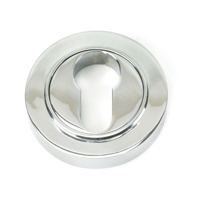 The Plain Concealed Standard Euro Escutcheon - Polished Chrome on a White Background The Plain Concealed Standard Euro Escutcheon - Polished Chrome on a White Background