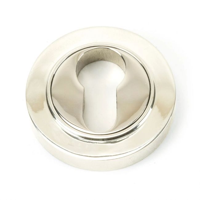 The Plain Concealed Standard Euro Escutcheon - Polished Nickel on a White Background The Plain Concealed Standard Euro Escutcheon - Polished Nickel on a White Background