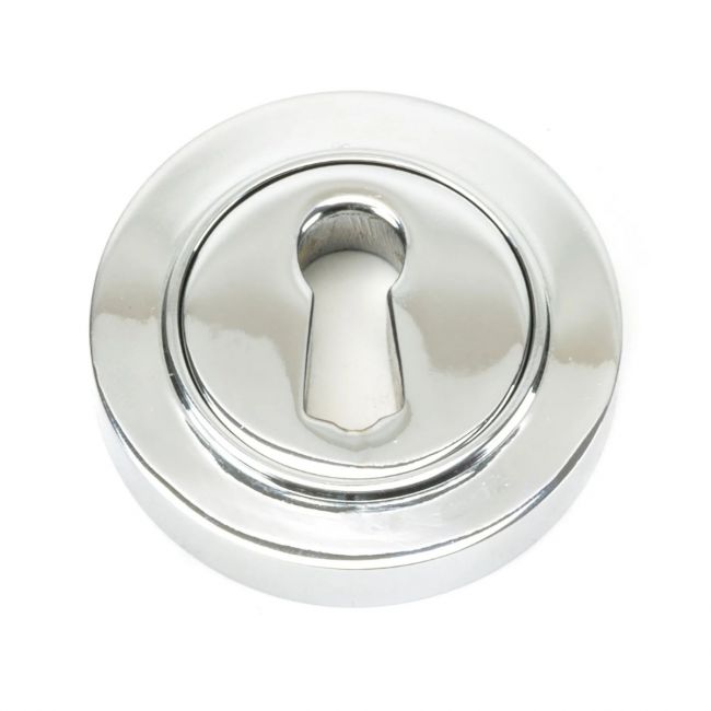 The Plain Concealed Standard Keyhole Escutcheon - Polished Chrome on a White Background The Plain Concealed Standard Keyhole Escutcheon - Polished Chrome on a White Background