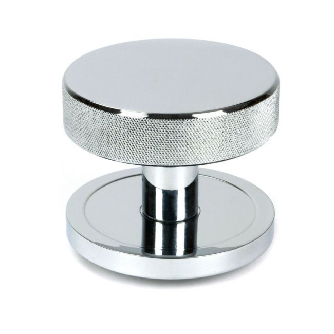 The Polished Chrome Knurled Centre Door Knob on Plain Rose Shown Upright on a White Background The Polished Chrome Knurled Centre Door Knob on Plain Rose Shown Upright on a White Background