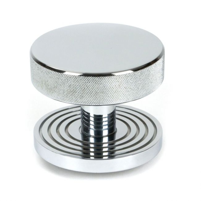 The Polished Chrome Knurled Centre Door Knob on Beehive Rose Shown Upright on a White Background The Polished Chrome Knurled Centre Door Knob on Beehive Rose Shown Upright on a White Background