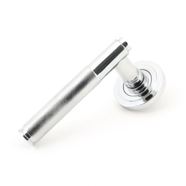 The Polished Chrome Knurled Lever on Art Deco Rose Set on a White Background The Polished Chrome Knurled Lever on Art Deco Rose Set on a White Background