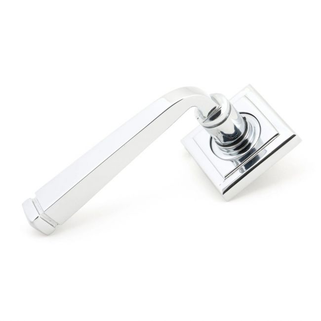 The Polished Chrome Tapered Lever on Square Rose Set on a White Background The Polished Chrome Tapered Lever on Square Rose Set on a White Background