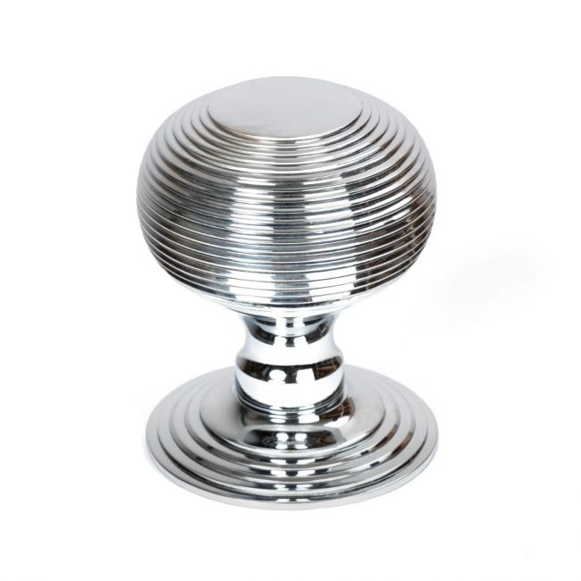 The Polished Chrome Traditional Beehive Centre Door Knob on a White Background Shown Upright The Polished Chrome Traditional Beehive Centre Door Knob on a White Background Shown Upright