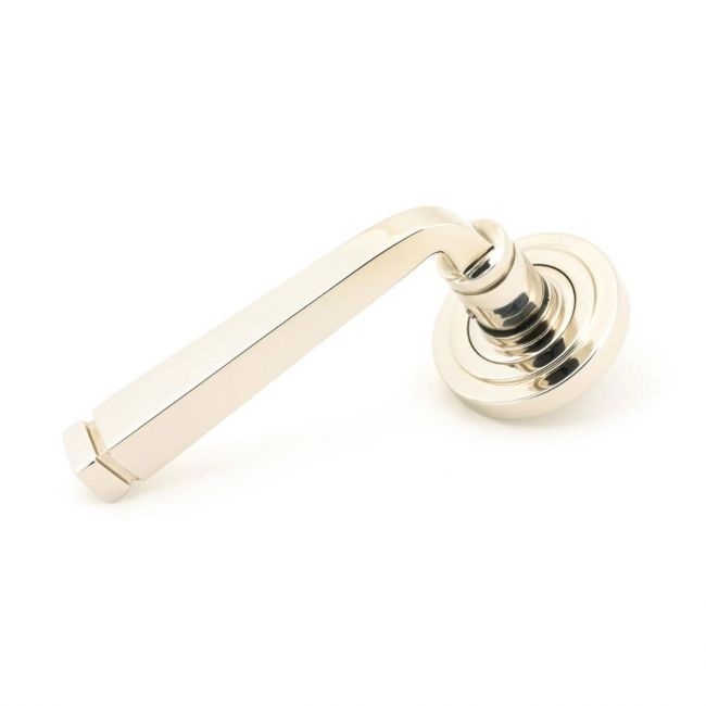 The Polished Nickel Tapered Lever on Art Deco Rose Set on a White Background The Polished Nickel Tapered Lever on Art Deco Rose Set on a White Background