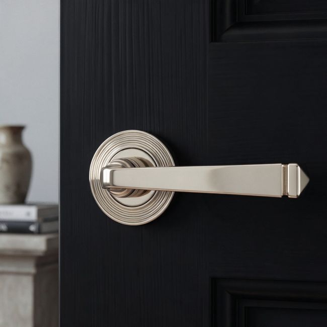 The Polished Nickel Tapered Lever on Beehive Rose Set on a White Background 