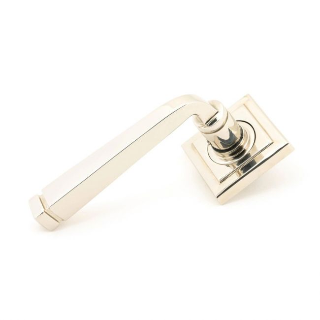 The Polished Nickel Tapered Lever on Square Rose Set on a White Background The Polished Nickel Tapered Lever on Square Rose Set on a White Background