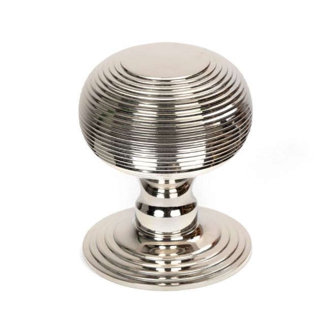 The Polished Nickel Traditional Beehive Centre Door Knob on a White Background Shown Upright The Polished Nickel Traditional Beehive Centre Door Knob on a White Background Shown Upright