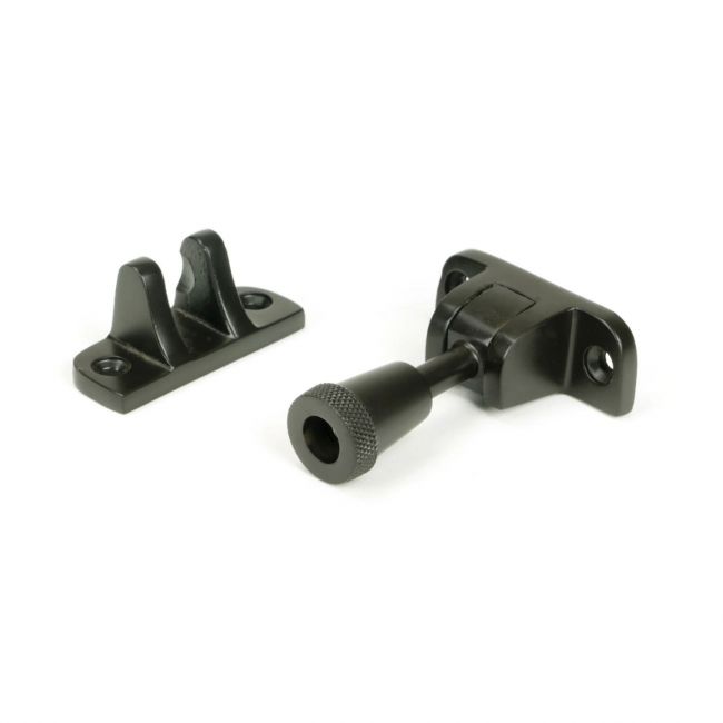The Radiused Knurled Brighton Sash Window Fastener in Aged Bronze on a White Background The Radiused Knurled Brighton Sash Window Fastener in Aged Bronze on a White Background