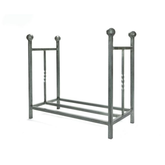 The Rectangular Fireside Log Holder with Ball Finials in Pewter Shown from an Angle on a White Background