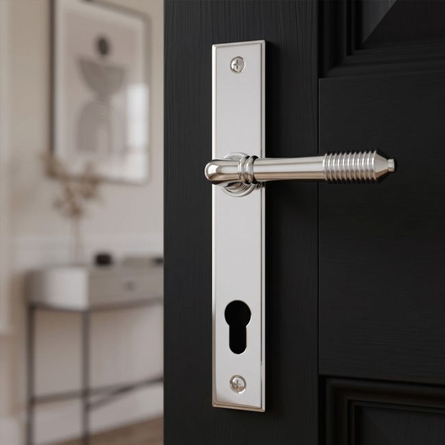 The Ribbed Slimline Exterior Door Handle in a Polished Chrome Finish Shown from the Front